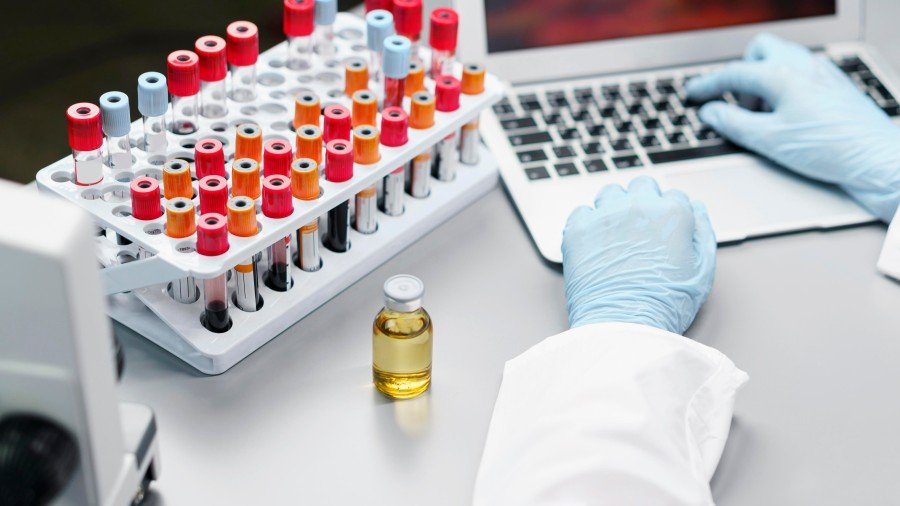 Pathology laboratory with blood sample test tubes and medical testing equipment